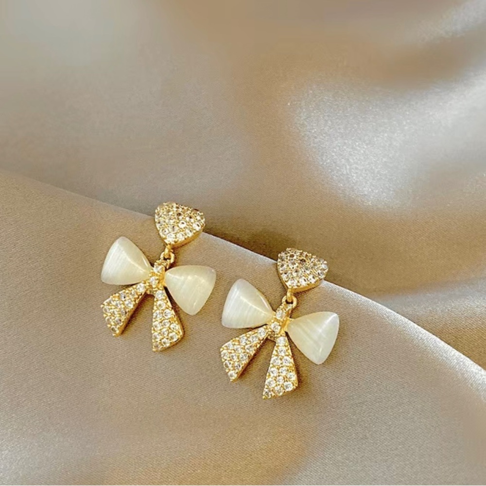 COPY - 🆕❗️Premium Cat Eye Stone Bow Drop Earrings Trendy and Elegant Celebrity … - Picture 3 of 6